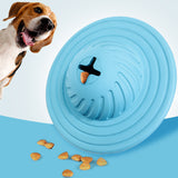 Treat Saucer with kibble dropping out of the cross-shaped opening